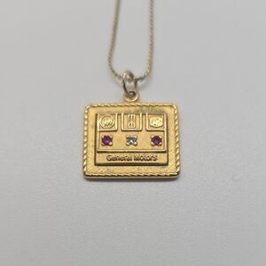 Gold General Motors Pendant Necklace
